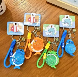 Creative Marine Animal Keychain Featuring a Whale Cute Pokémon Ball Liquid Sand Pendant Bag Accessory
