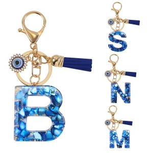 Cross border Bestseller Royal Blue Fashionable English Letter Resin Keychain Evil Eye Tassel Bag Accessory Pendant Gift