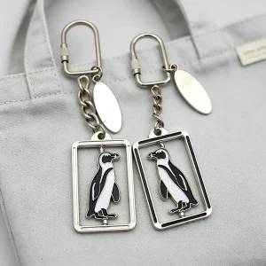Custom LOGO Rotatable Metal Keychains Penguin Sea Animals Cartoon Spinner Soft Enamel Key Chains with Personalized Engraved Tag