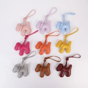 Cute Pink Puppy Bag Charm with Bow Detail, Soft PU Leather Hanging Ornament for Handbag Backpack Luggage Accessories