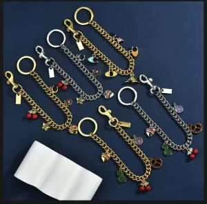 Factory Outlet Fashion Ins Style Dinosaur Love Shell Cherry Small Electroplated Metal Pendant Crossbody Bag Chain Hanging