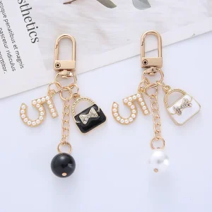 Fashion Hot Flower Pearl Charm Keychain Pendant Creative Bag Car Earphone Case Decoration Pearl Key Ring Key Chain Accessories