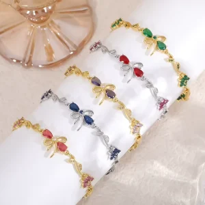 Fine Fashion Jewelry 18k Gold Plated Brass Bowknot Bracelet Zircon Flower and Bow Charm Bracelet for Women