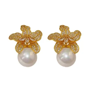French Style Light Luxury Imitation Pearl Gold Plated Alloy Drop Earrings Women’s High end Niche Unique Exaggerated