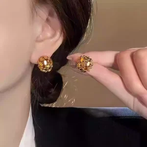 Glamorous Gold Hollow Spherical Stud Earrings for Women Shiny Metal Openwork Design Lightweight Fashion Jewelry for Daily Party