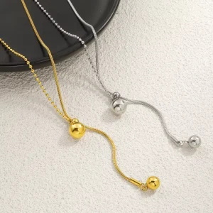 Long pull out gold round bead womens accessory with a light luxury and high end feel asymmetrical splicing necklace