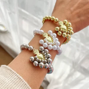 Luxury Beaded Stretch Bracelet with Gold Pineapple Charm Elegant Statement Jewelry for Women
