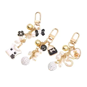 Luxury Bow Pearl Bear Key Chains Cute Headphone case Keychain Accessories Bag Pendant Fashion Key Ring Women Gift Heart Keychain