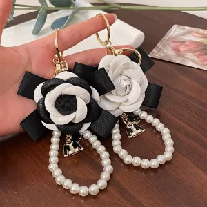 Luxury Cartoon Fashion Alloy Black Rose Key Chain Gold Tone Hook Ribbon & Pearl Decor Stylish Coin Holder Bag Charm Keychain