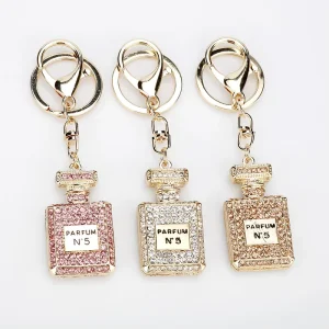 Luxury Metal Crystal Perfume Bottle Pendant Keychain Fashion Rhinestone Keyring for Women Bag Charm Car Key Jewelry Accessories