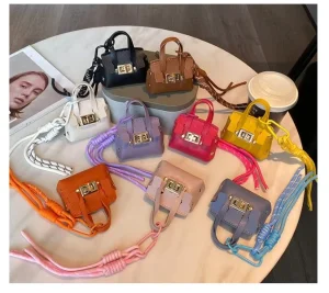 Mini Platinum Leather Key Chain with Portable Multi-Function Bag Pendant Keychain for Lipstick Headset Mini Bag
