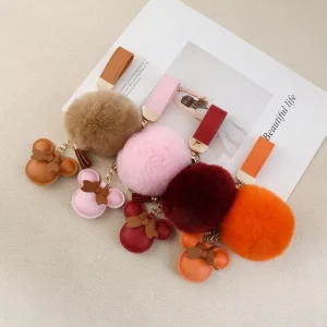 New Style Keychain Fashion Pompom Bag Charms Genugine Leather Car Key Chain Accessories Custom Luxury Fur Keychain
