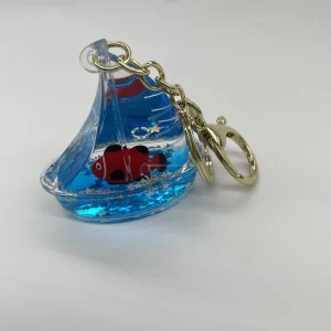 Sailing Boat Shape Plastic Acrylic Keychain with Custom Delicate 3D Inner Ocean Series Figure Shining Glitter Gift