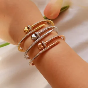 Women’s Light Luxury High end Sense Zircon inlaid Electroplated Heart shaped Stainless Steel Nail Bracelet Ring Cross border